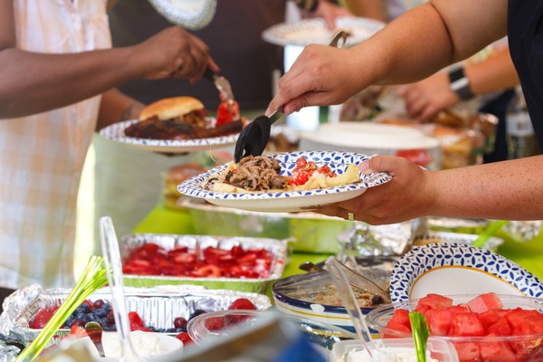 A potluck is a fun birthday event that'll allow everyone to chip in.