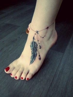 woman's death anklet foot tattoo