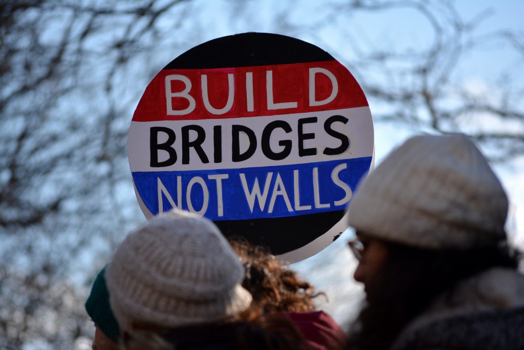 ice nyc protests with anti trump sign