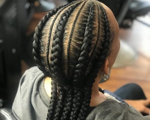 Flaunt your beautiful and bouncy hair with five cornrow braided hairstyle.