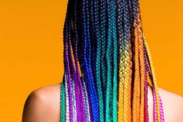 Rainbow braids hairstyle is trending in 2021.