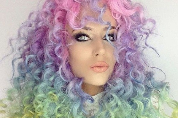 Pastel rainbow curls are trending this season.