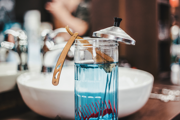 Disinfecting razor and comb