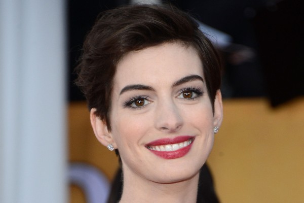 Anna Hathaway flaunts a sleek pixie as professional hairstyles.