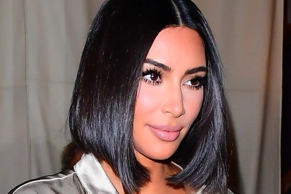 Kim Kardashian flaunts a straight lob hairstyle.