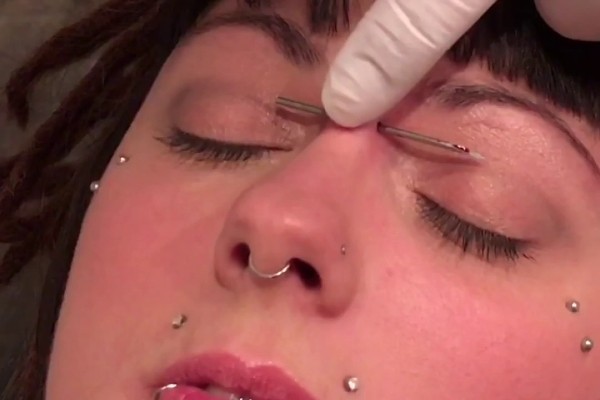 Taking care of a bridge piercing.