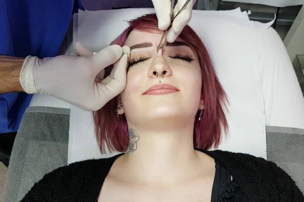 Get a nose bridge piercing.