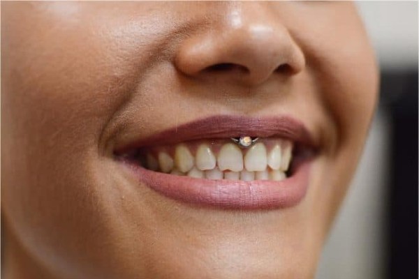 Know the pros of smiley piercing