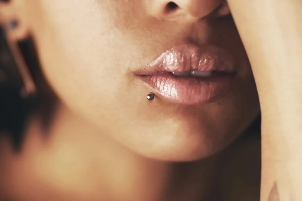 Minimizing your pigmentation after getting a lip piercing. 