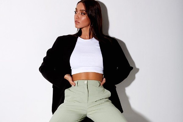 Style darker tops with sage pants