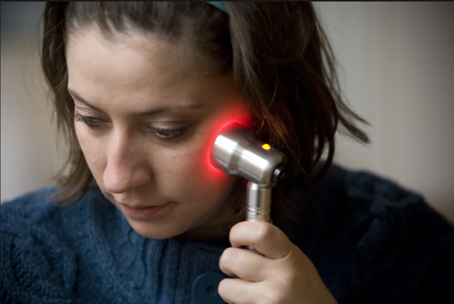 Girl using Infrared Light wand