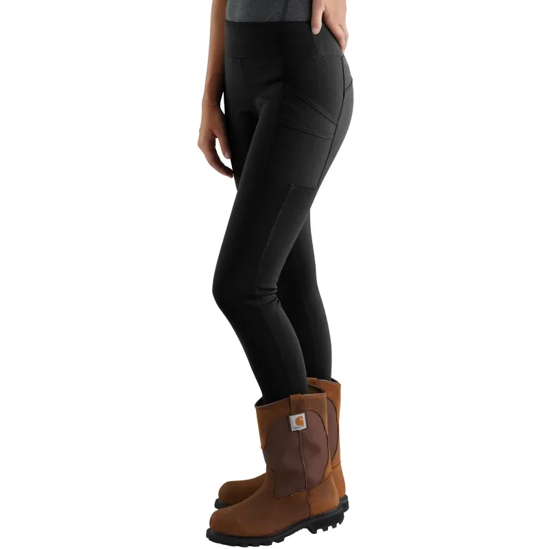 A lady in Carhartt 3/4 leggings