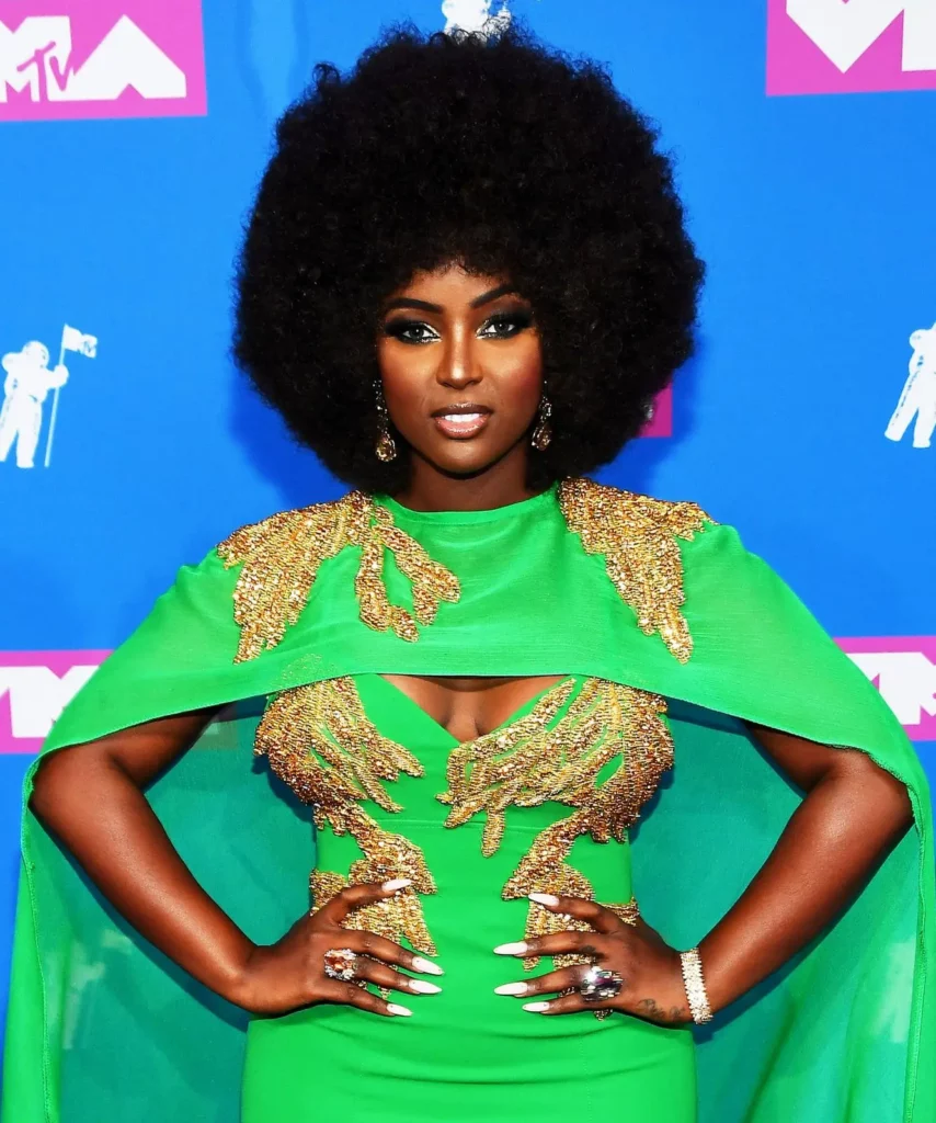 Amara La Negra in white nail Polish